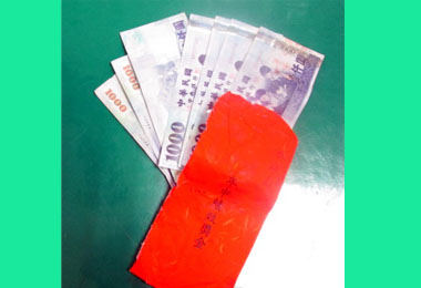 好心伯讓失主年終獎金失而復得(圖)